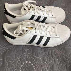 Adidas sneakers worn a couple times.
